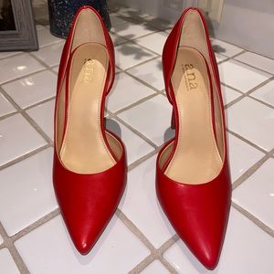 Red a.n.a point heels. Size 7.